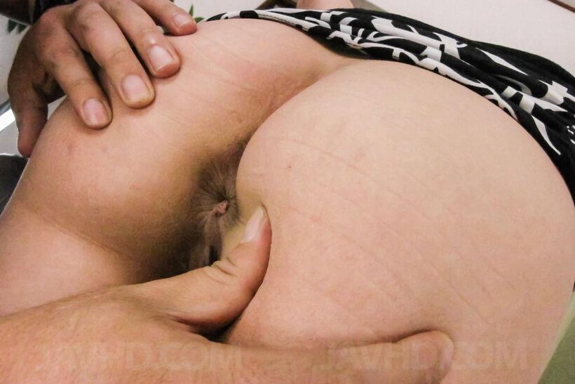 Photo 13 — On a sofa, Imai Yoshimi gets her shaved pussy teased and played with
