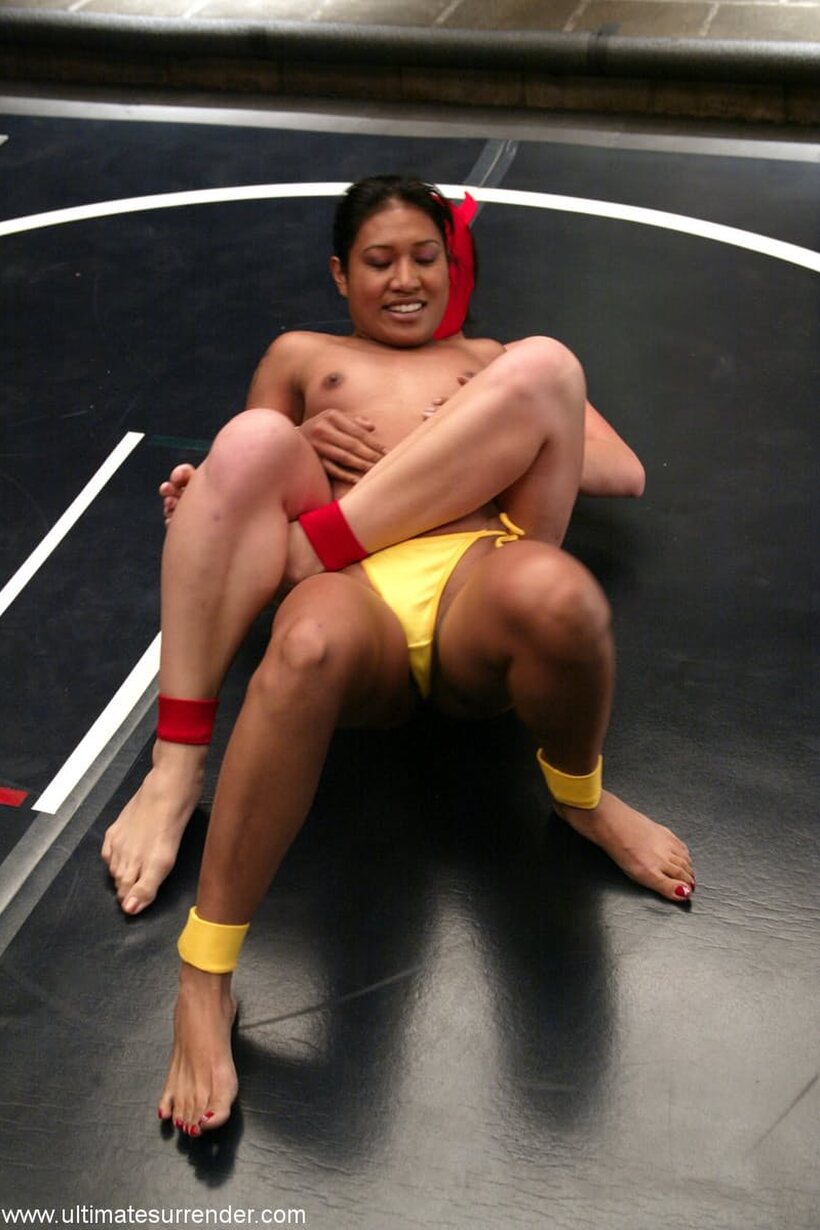 Lyla Lei and Crimson Ninja warm up for a topless wrestling bout, photo 12 of 20