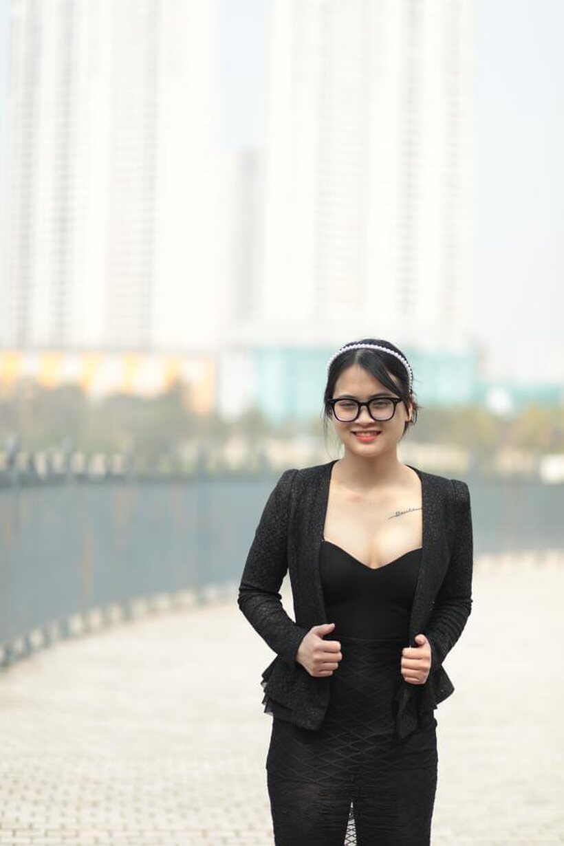 Photo 4 — Posing outdoors in a hot black outfit, curvy Asian girl with glasses