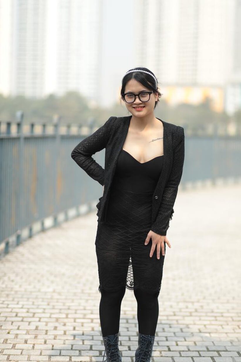 Photo 7 — Posing outdoors in a hot black outfit, curvy Asian girl with glasses