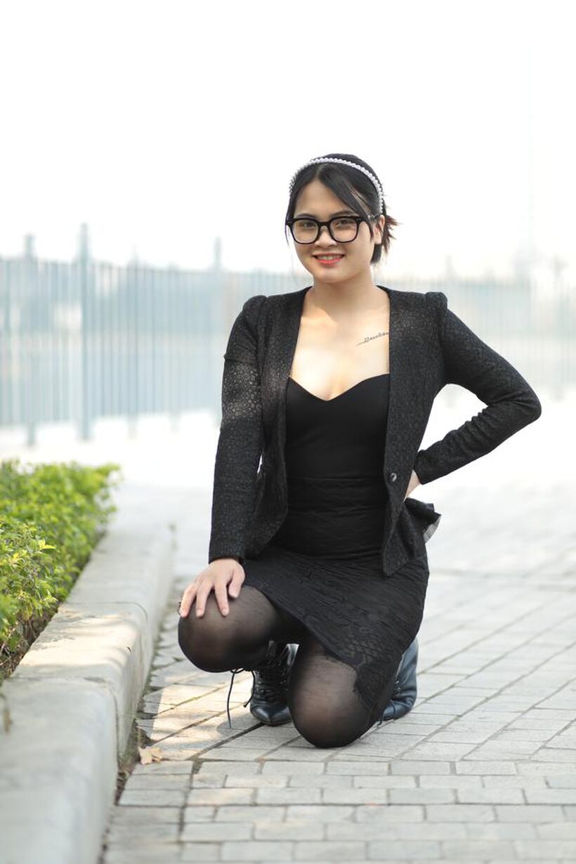 Photo 19 — Posing outdoors in a hot black outfit, curvy Asian girl with glasses