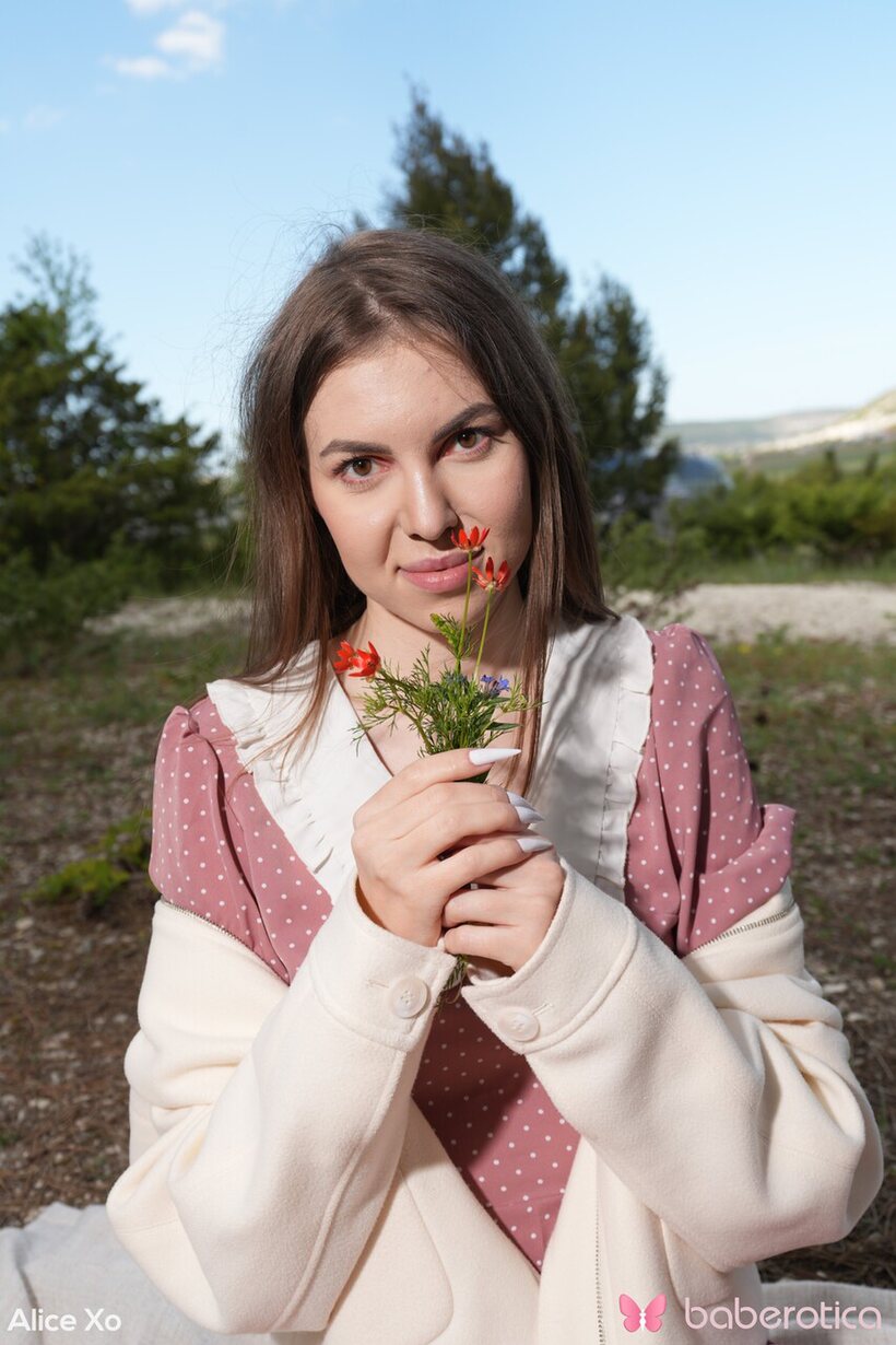 Image 1/21: On a blanket, Alice Xo spreads her tight pussy outdoors