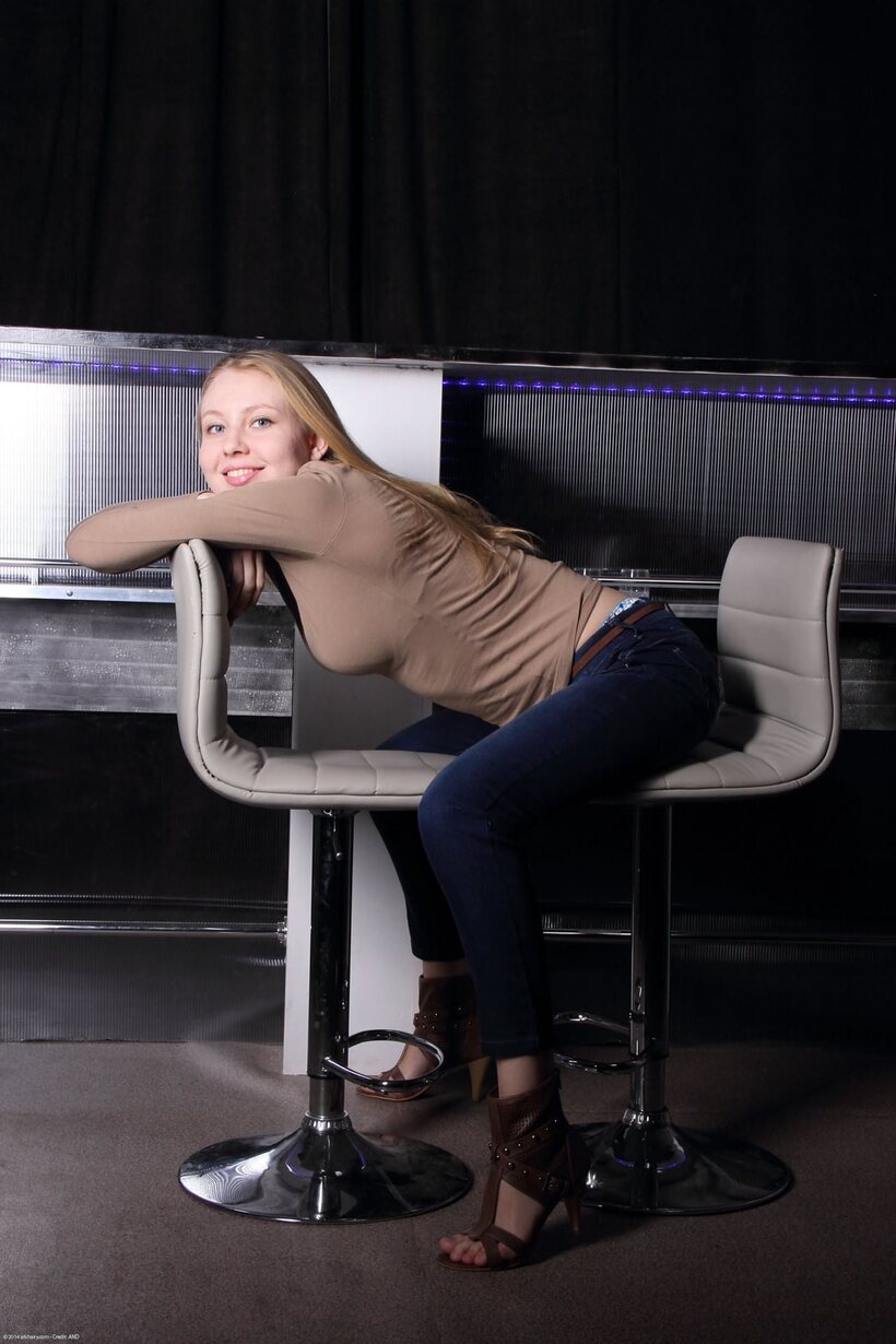 Amateur pic 5 from the set «Long-haired teen with big eyes strips naked for her first time»
