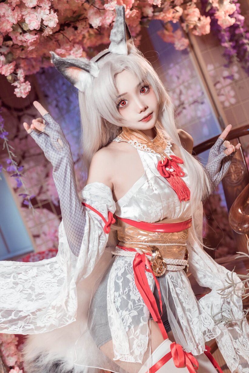 Photo 2 — Platinum blonde Asian girl poses outdoors in cosplay lingerie
