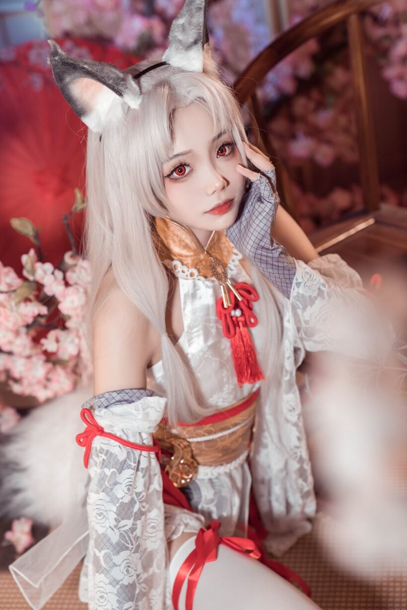 Photo 3 — Platinum blonde Asian girl poses outdoors in cosplay lingerie