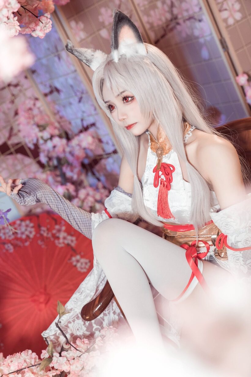 Image 7/10: Platinum blonde Asian girl poses outdoors in cosplay lingerie