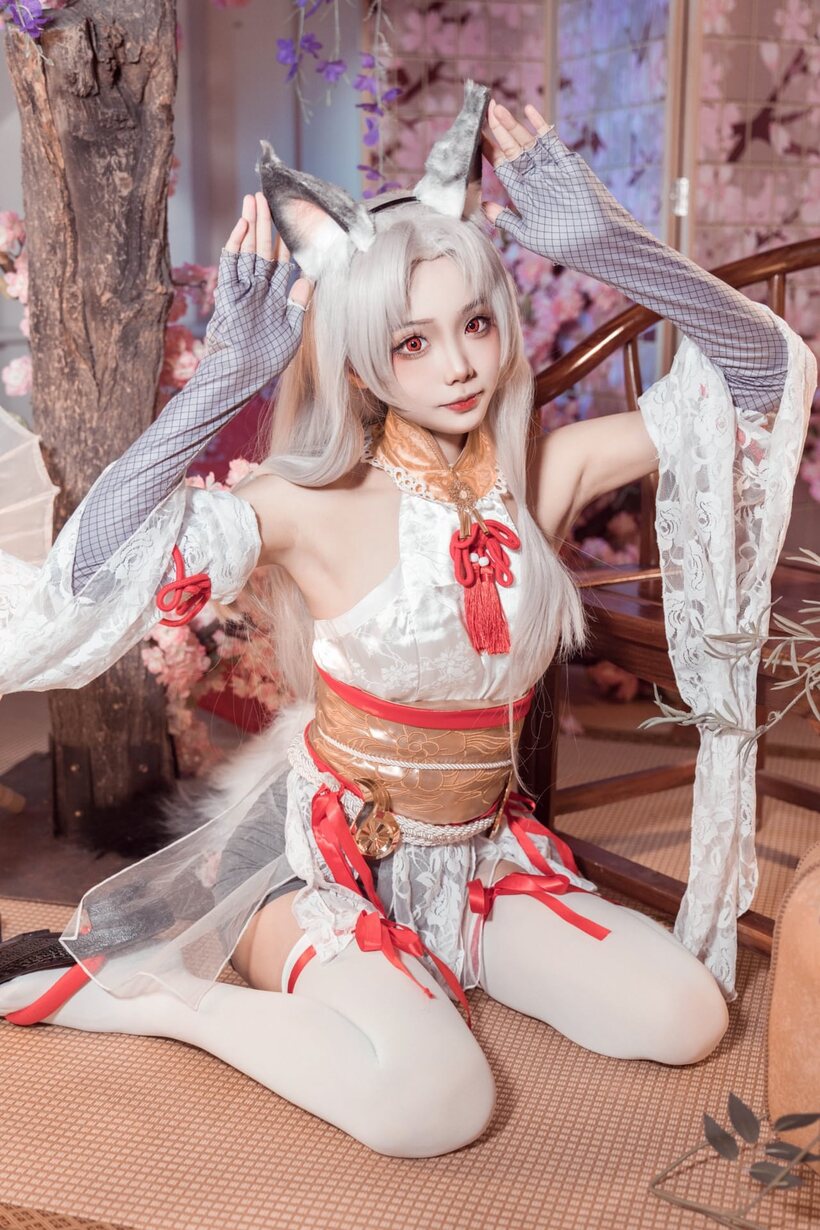 Image 10/10: Platinum blonde Asian girl poses outdoors in cosplay lingerie