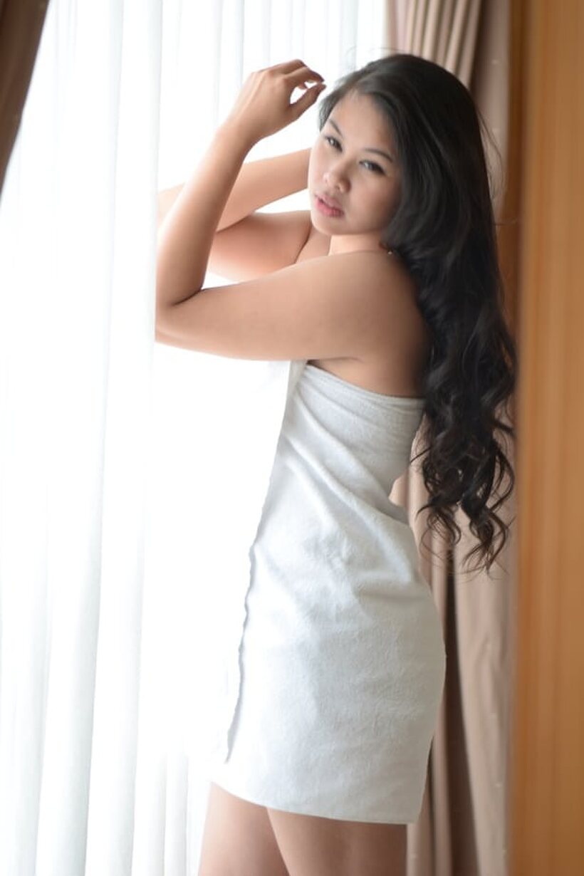Brunette girl gets naked and starts teasing in lingerie (shot 20)