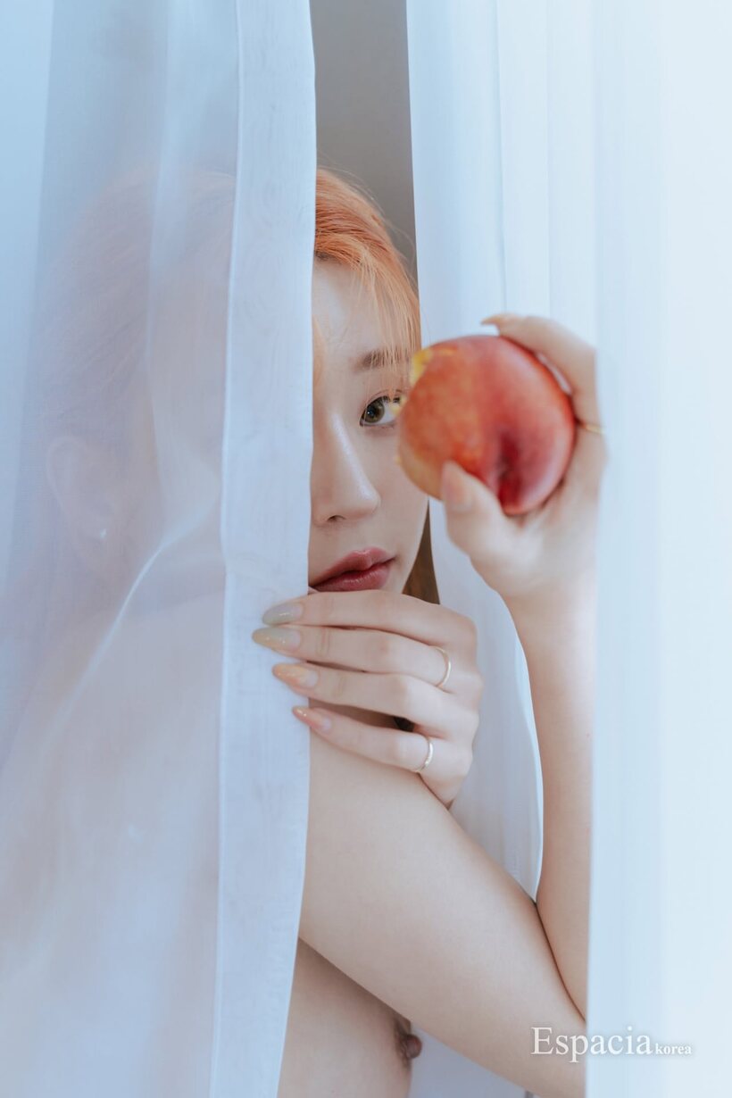 Asian pic 8 from the set «Orange-haired Korean babe showcases her fake tits and round ass solo»