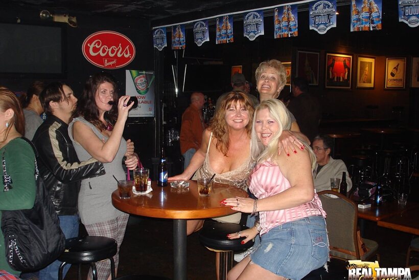 Mature Dee Delmar plays with a dildo and shows her big tits at a party with Tracy Lick, photo 8 of 15