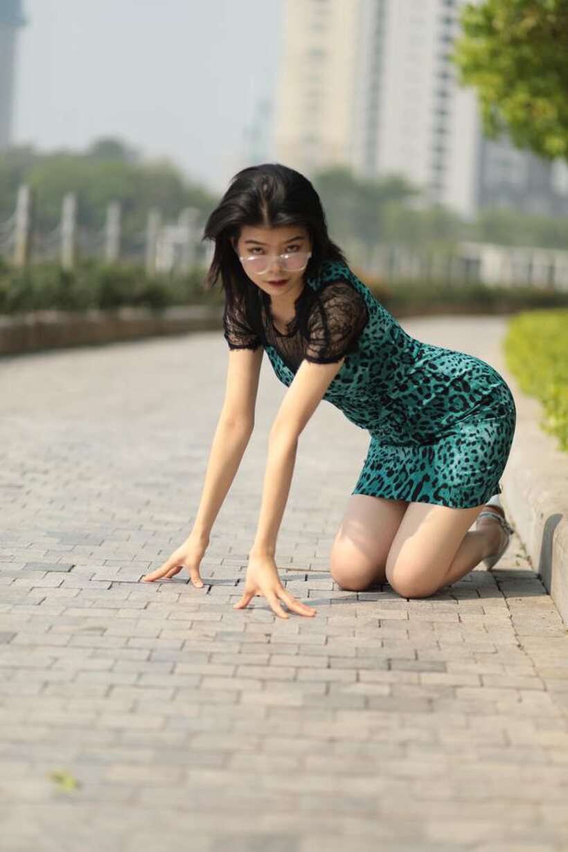 Asian pic 1 from the set «Clothed girl flaunts her legs while flashing in public»