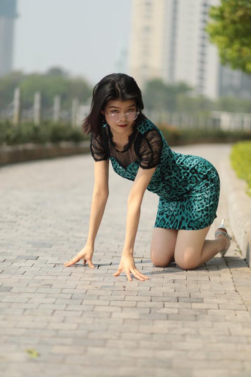 Asian nude photo 5 — Clothed girl flaunts her legs while flashing in public