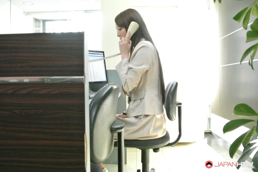 Akari Asayiri slips away from office work for a solo pussy break (shot 2)