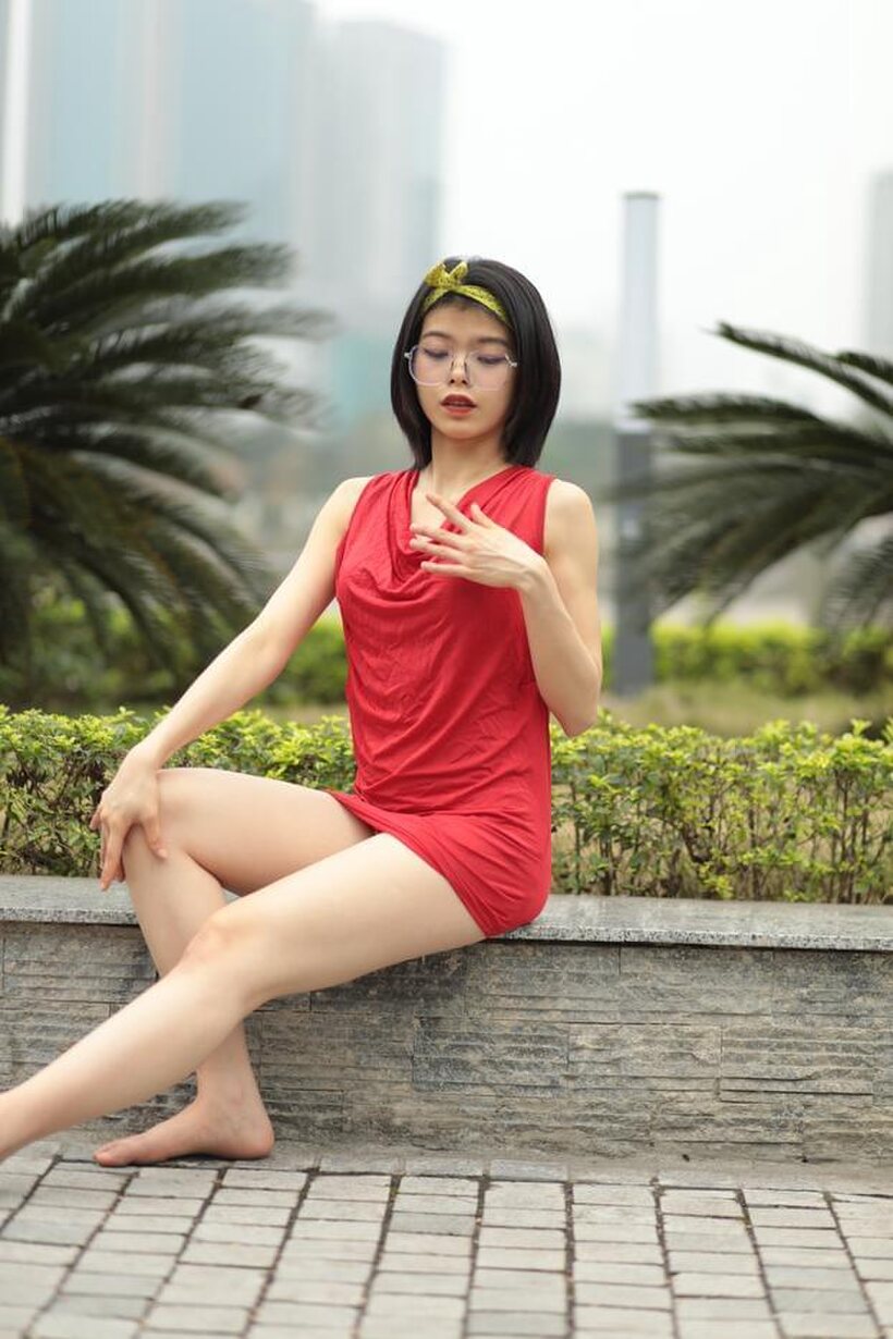 Asian nude photo 4 — Brunette girl strips out of her skirt and poses naked