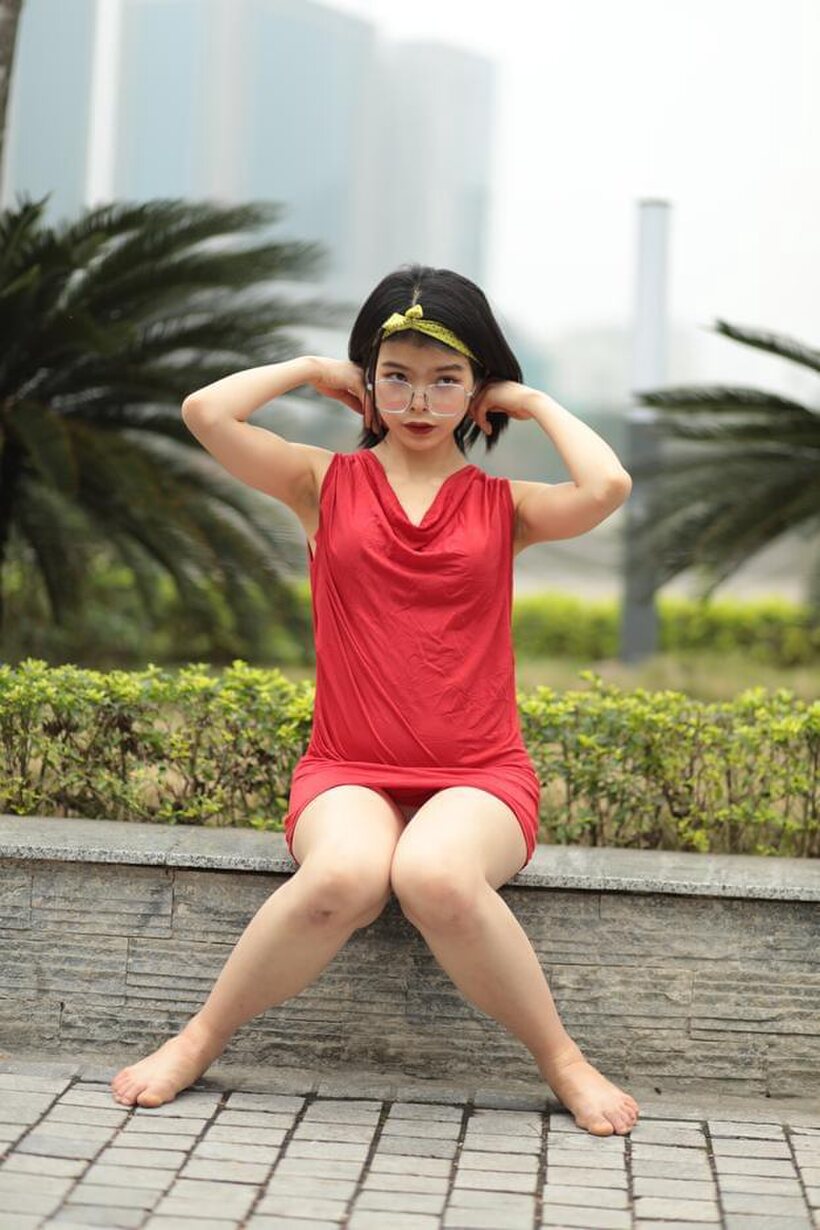 Asian nude photo 12 — Brunette girl strips out of her skirt and poses naked