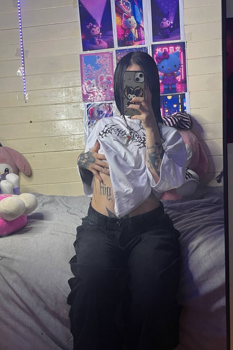 Tattooed Latina teen poses for mirror selfies, baring her flat stomach (shot 1)