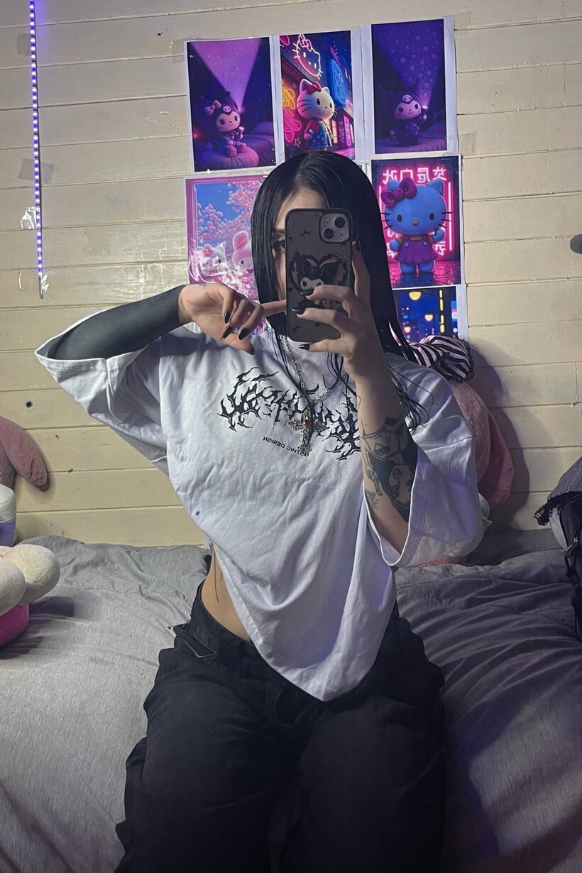 Photo 2 — Tattooed Latina teen poses for mirror selfies, baring her flat stomach