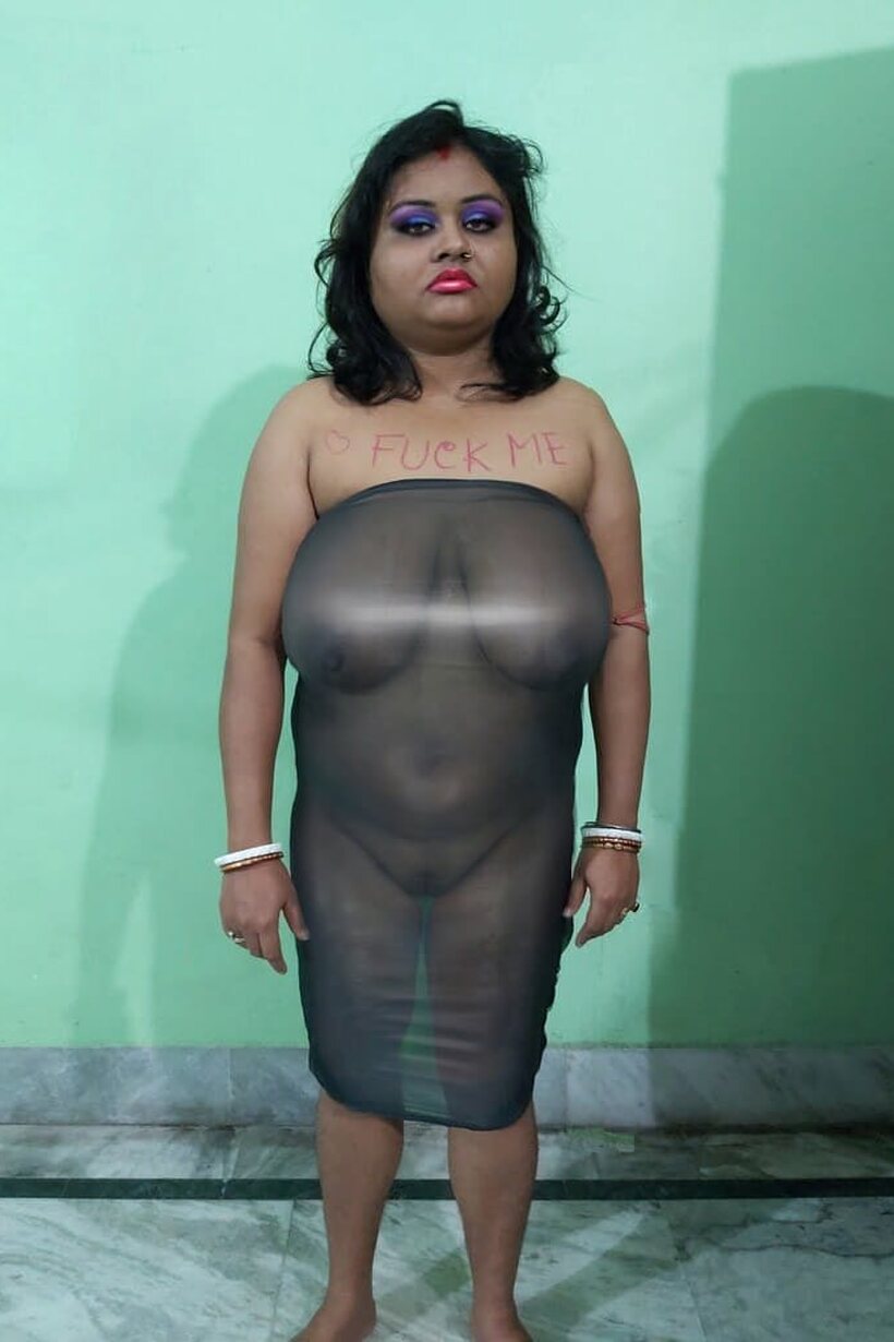 Photo 12 — MILF spreads her creampied pussy in a group scene