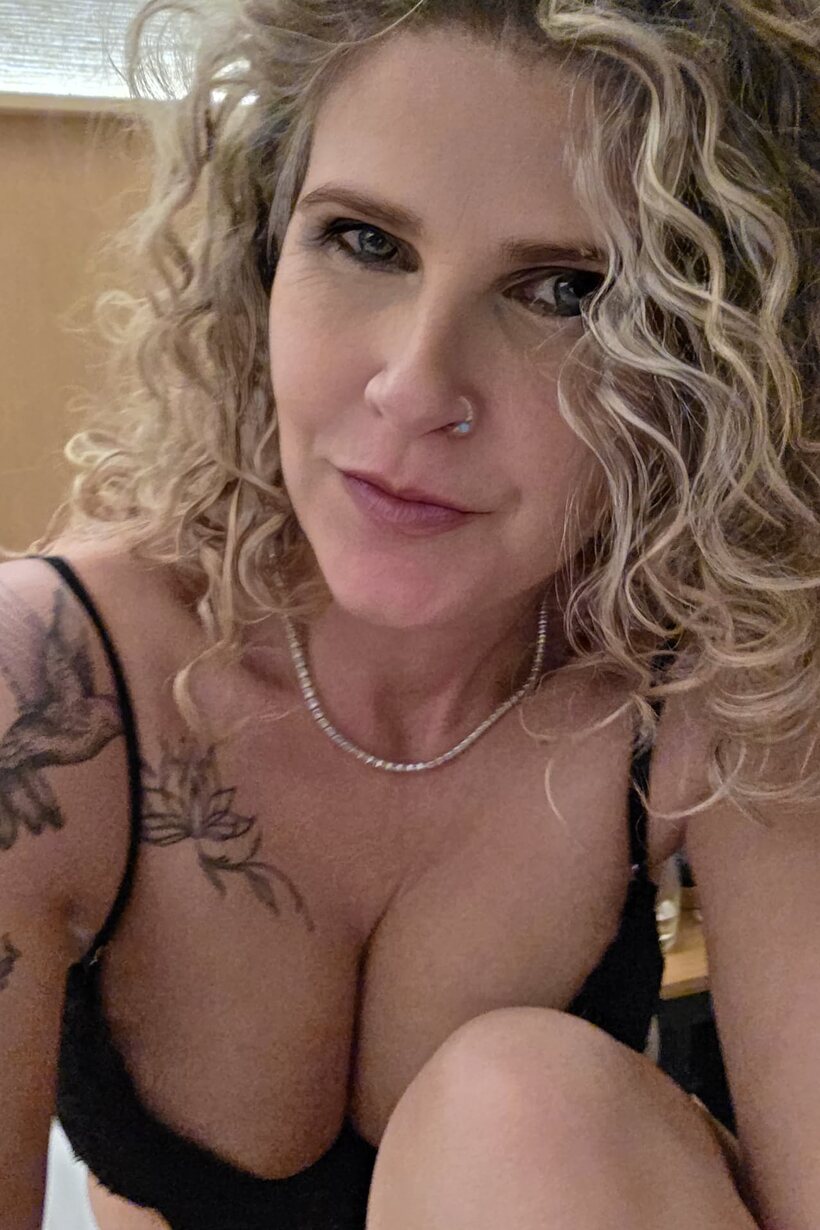 BBW nude photo 10 — Curly-haired MILF models black lingerie while playing solo for the camera