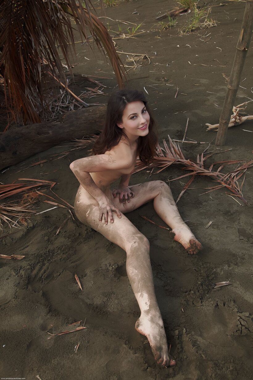Photo 17 — Naked teen gets coated in mud on private property