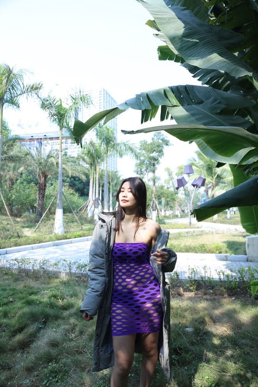 Image 4/20: Outdoor compilation of a brunette babe flashing her shaved pussy