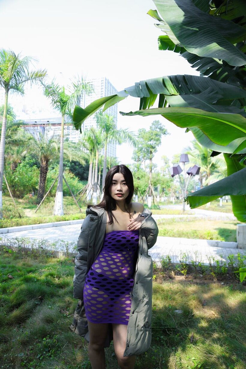 Image 5/20: Outdoor compilation of a brunette babe flashing her shaved pussy