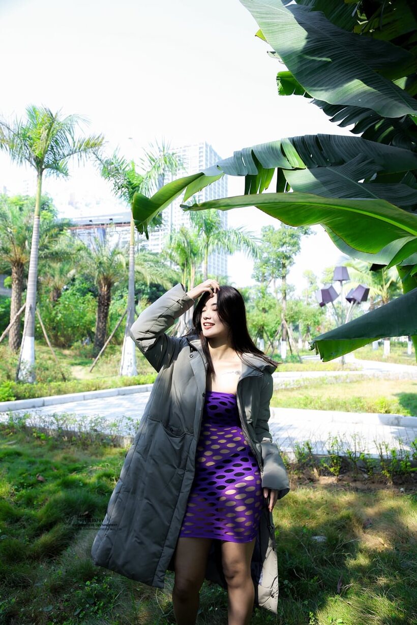 Asian pic 7 from the set «Outdoor compilation of a brunette babe flashing her shaved pussy»
