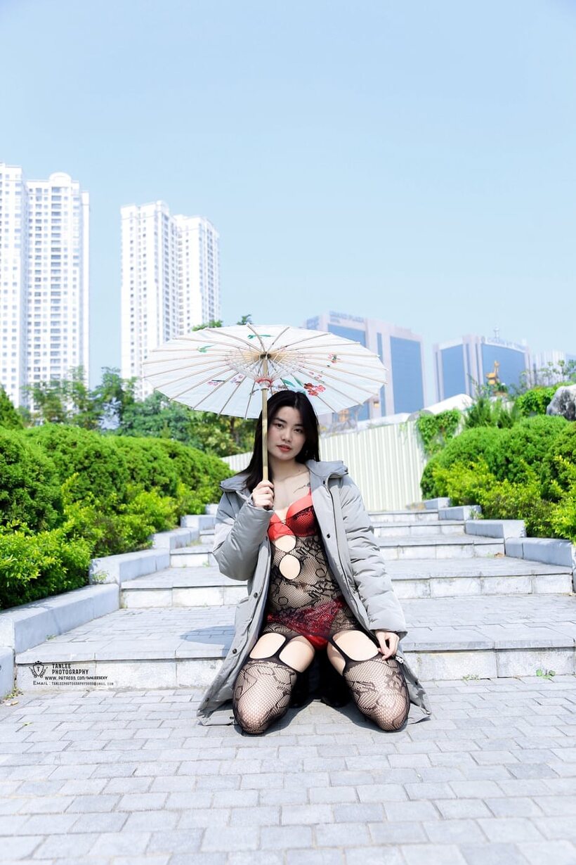 Outdoor compilation of a brunette babe flashing her shaved pussy, photo 18 of 20