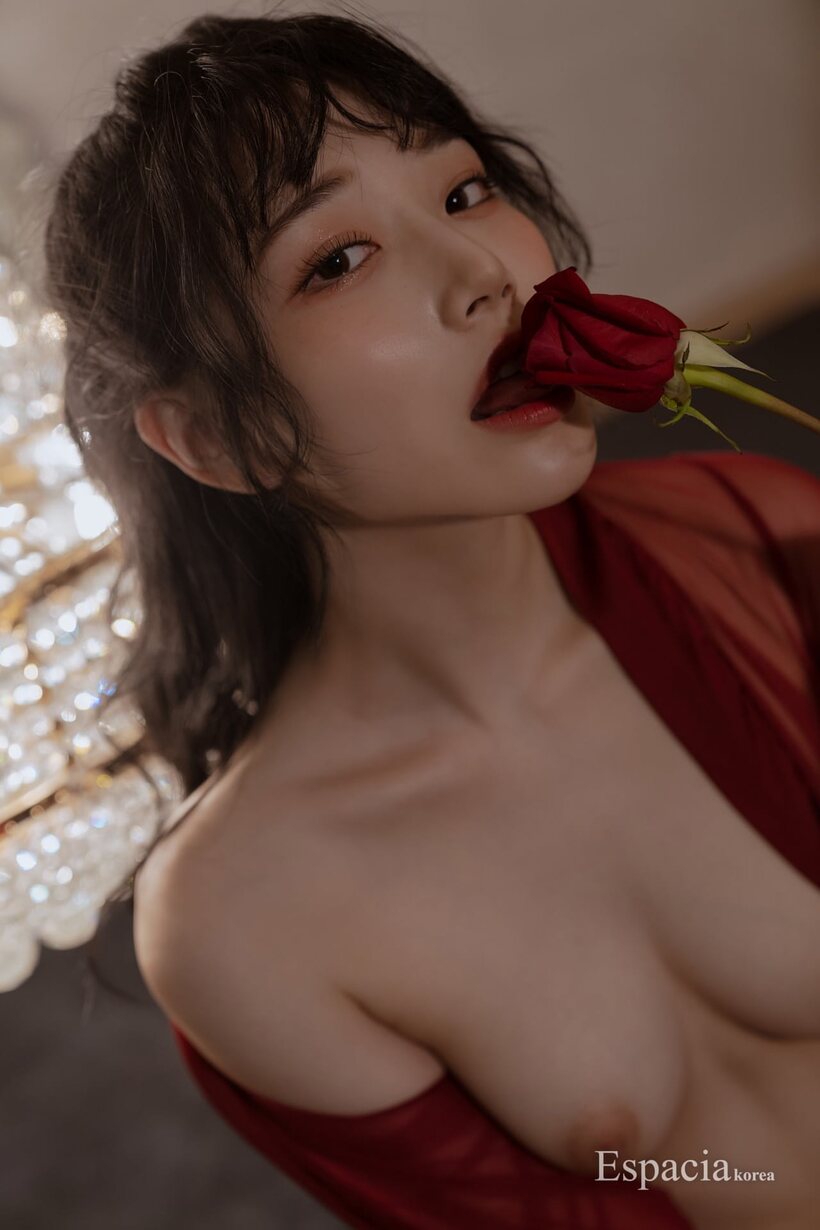 Asian pic 10 from the set «Teasing a rose, this cute Asian model shows off her small tits»