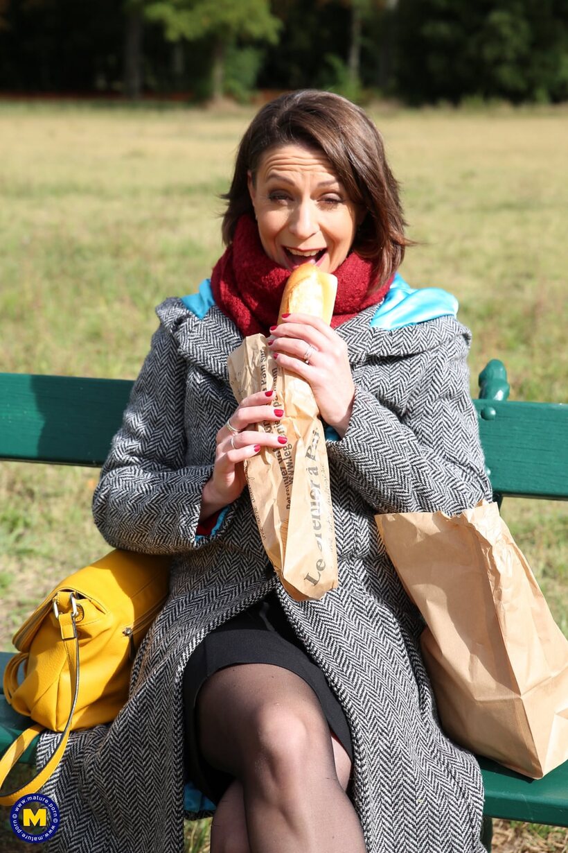 Photo 3 — Mature girl gets naked and starts flashing outdoors
