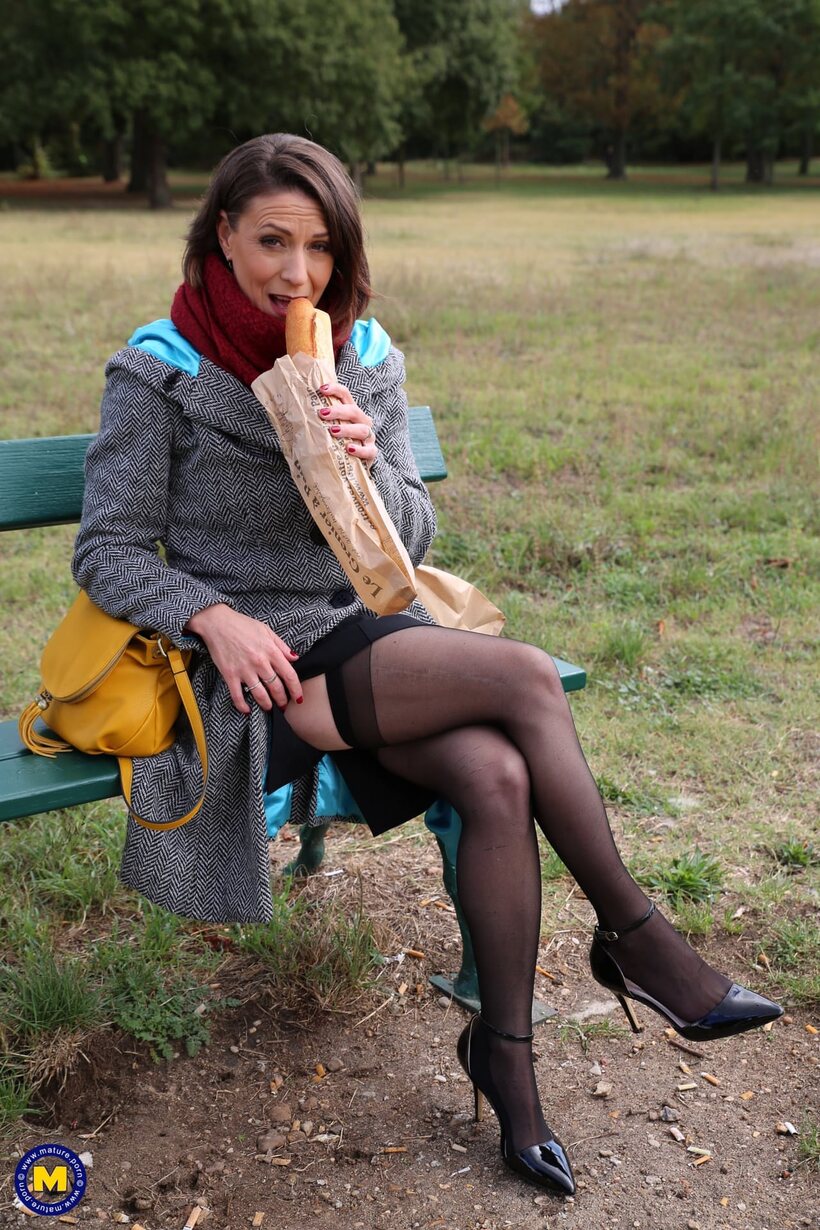 Mature girl gets naked and starts flashing outdoors, photo 7 of 20