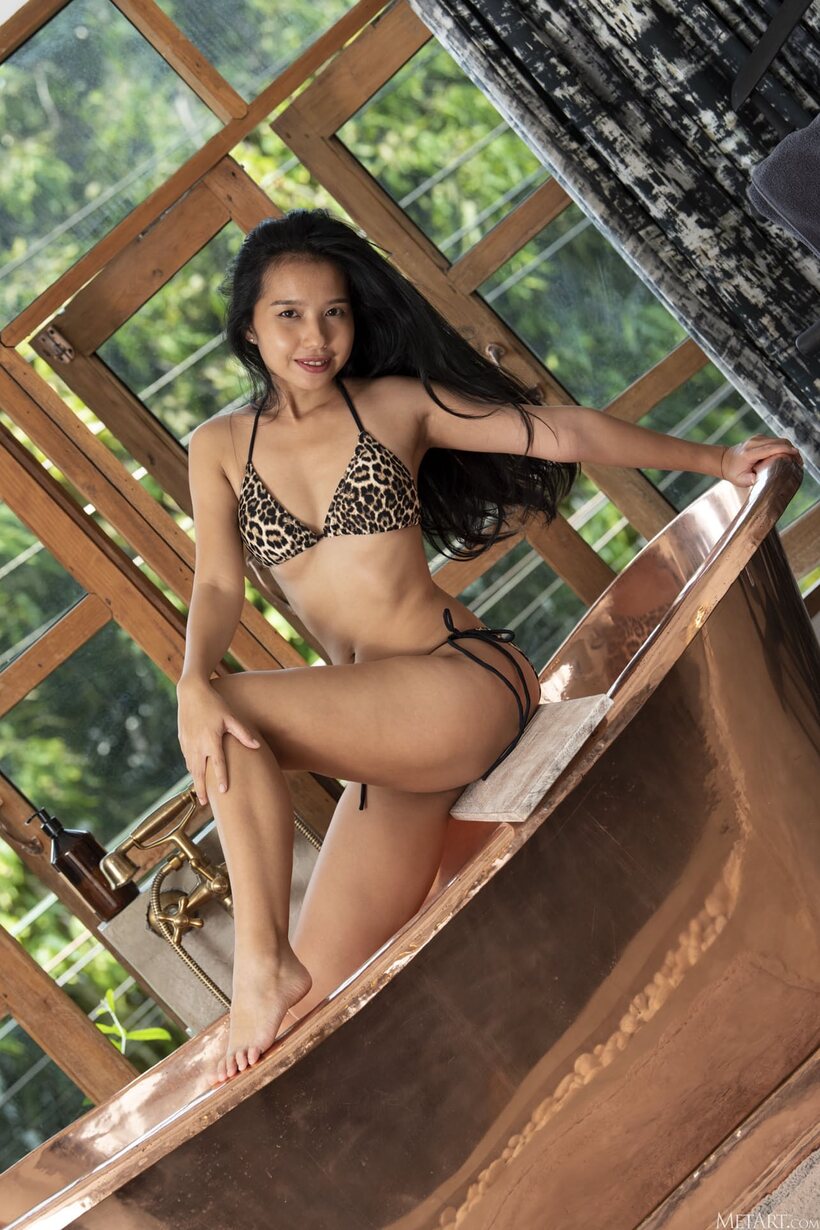 Photo 3 — Wet girl flaunts her hairy pussy and ass