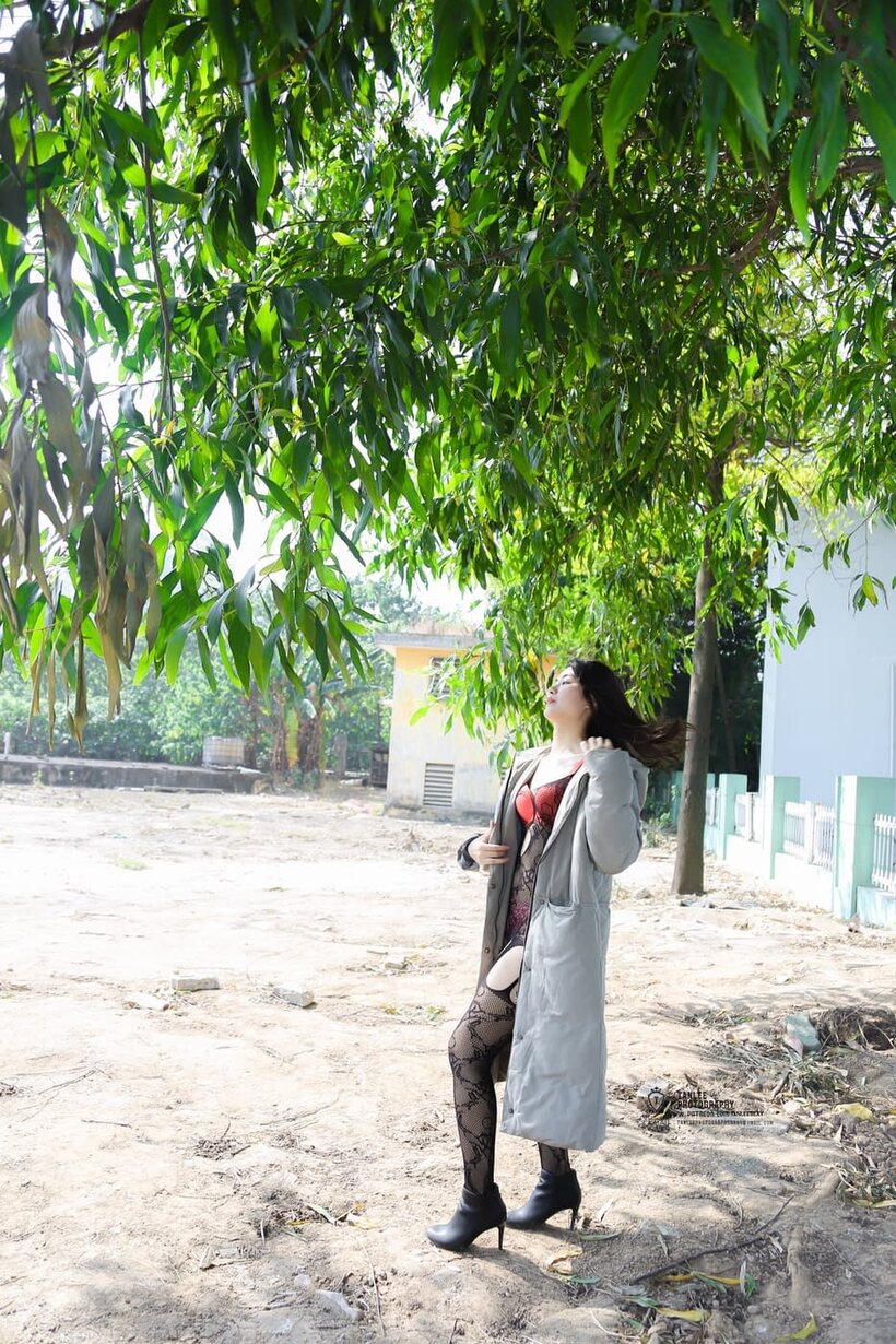 Image 18/21: Asian girl gets naked outdoors and shows her ass