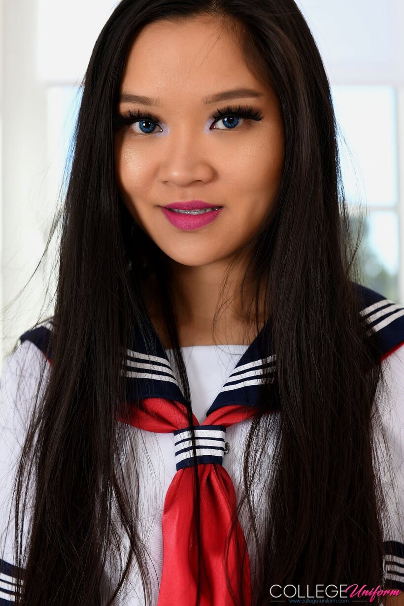 Image 4/21: Asian Louisa Lu strips out of her uniform and poses naked