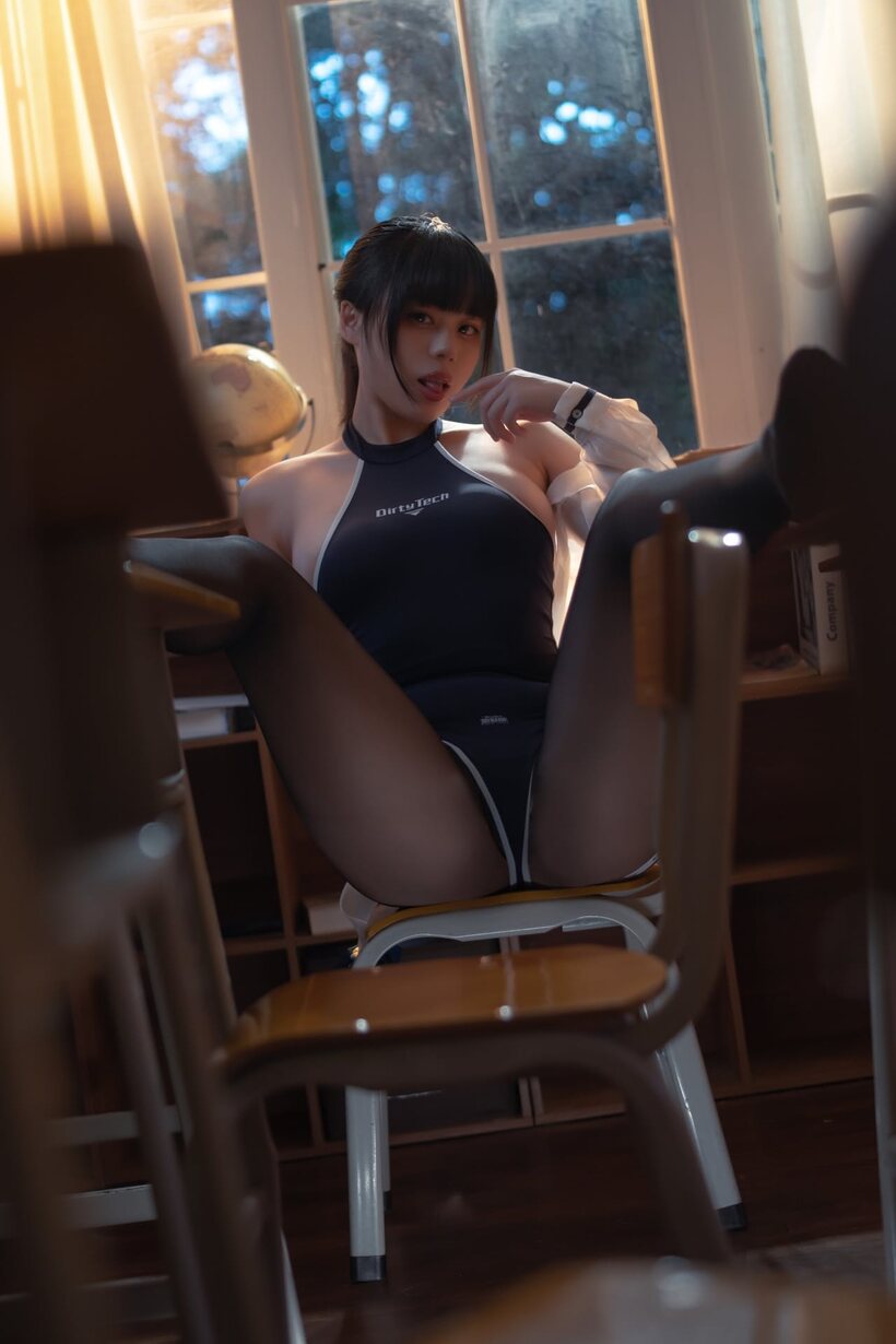 Asian nude photo 5 — Big booty on display as a beautiful Asian babe models a bodysuit and pantyhose
