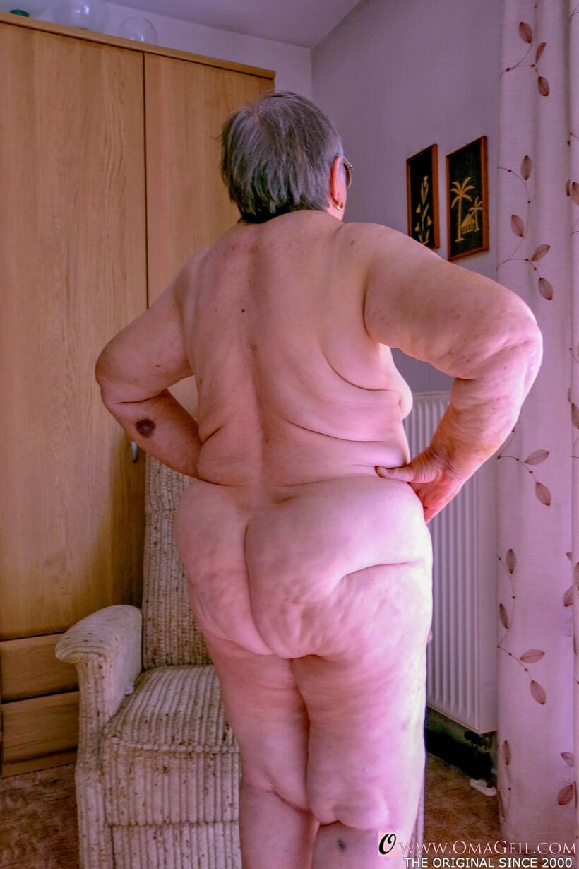 Amateur nude photo 12 — Obese granny gets naked, then covers her face with a towel