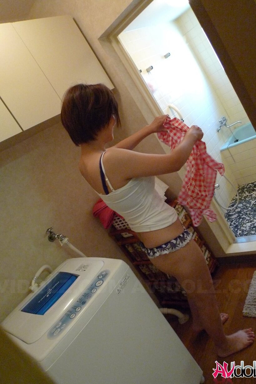 Image 16/20: Housewife Meguru Kosaka gets naked and starts spreading