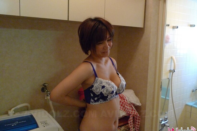 Photo 18 — Housewife Meguru Kosaka gets naked and starts spreading
