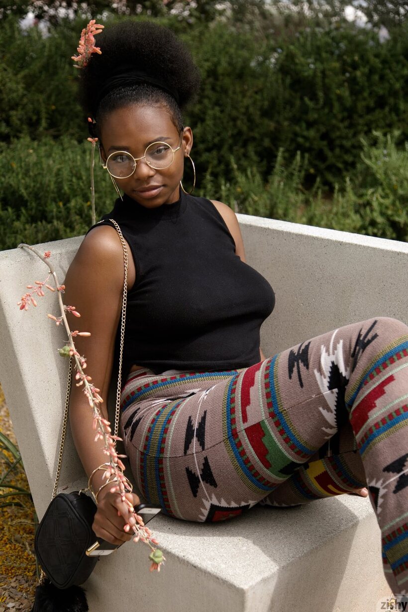 Image 3/12: Clothed Neda Marie in glasses shows her ass outdoors